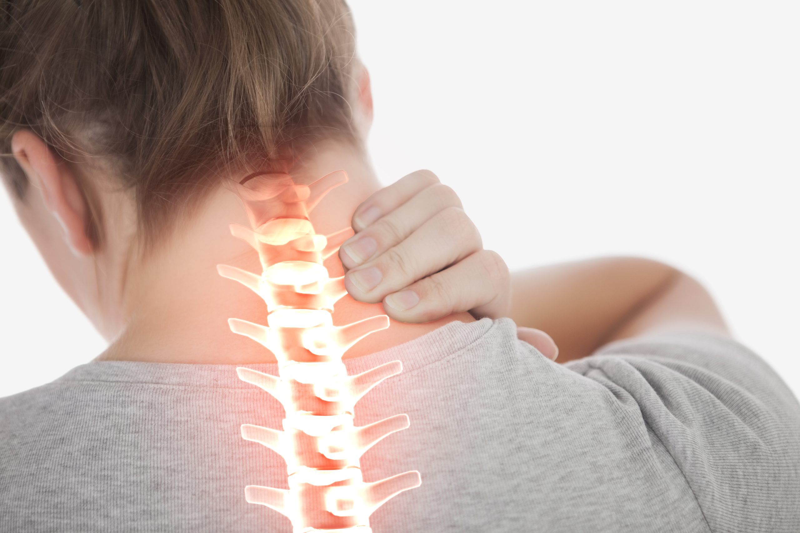 Digital,Composite,Of,Highlighted,Spine,Of,Woman,With,Neck,Pain